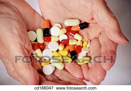 Hands and many pills View Large Photo Image Stock Photo - Hands and many pills. Fotosearch