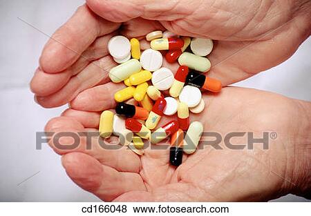 Hands and many pills View Large Photo Image Stock Photo - Hands and many pills. Fotosearch