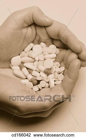 Hands with many pills View Large Photo Image Stock Image - Hands with many pills. Fotosearch