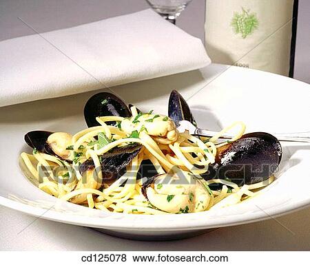 Linguini with fresh mussels View Large Photo Image Stock Photo - Linguini with fresh mussels. Fotosearch