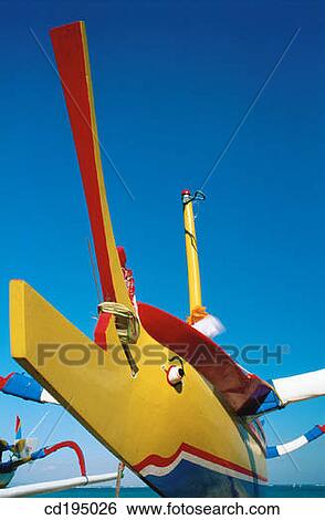 Outrigger boat helmsman. Sanur Beach. Bali. Indonesia View Large Photo Image Stock Photograph - Outrigger boat helmsman. Sanur Beach. Bali. Indonesia. Fotosearch