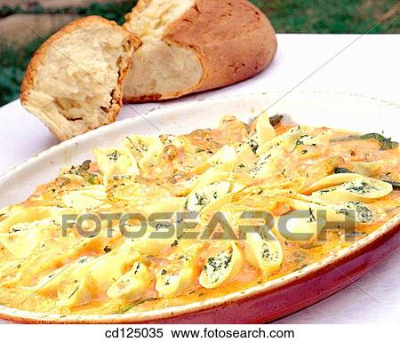 Pasta filled with spinach and ricotta cheese View Large Photo Image Stock Photography - Pasta filled with spinach and ricotta cheese. Fotosearch