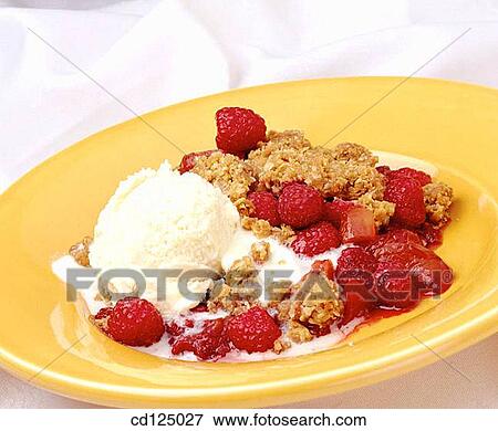 Peach crumble with ice cream View Large Photo Image Stock Photo - Peach crumble with ice cream. Fotosearch