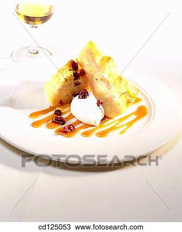 Pear and cranberry bread pudding View Large Photo Image Stock Image - Pear and cranberry bread pudding. Fotosearch