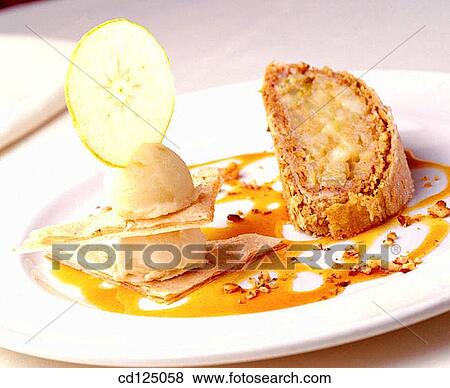 Phyllo roulade with apples and ice cream View Large Photo Image Stock Photo - Phyllo roulade with apples and ice cream. Fotosearch