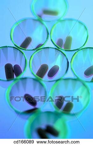 Pills in cups View Large Photo Image Stock Photo - Pills in cups. Fotosearch
