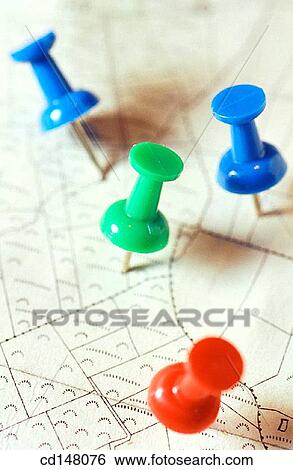 Stock Photograph - Pins marking place on map. Fotosearch