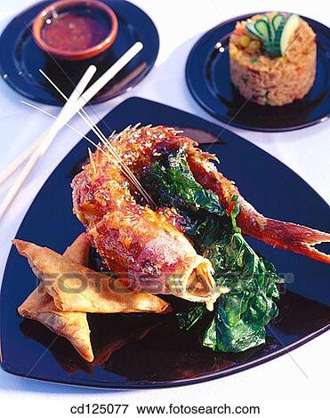 Sizzling whole fish View Large Photo Image Stock Photo - Sizzling whole fish. Fotosearch