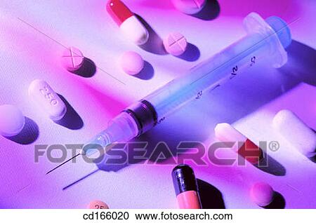 Syringe and pills View Large Photo Image Stock Image - Syringe and pills. Fotosearch
