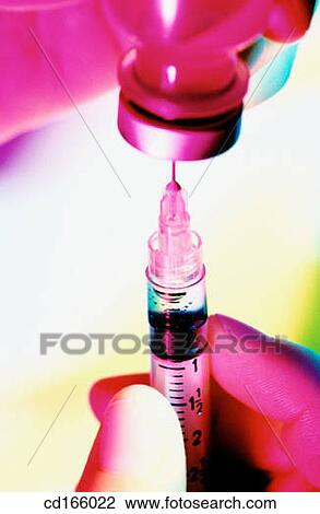 Stock Image - Syringe and vial. Fotosearch