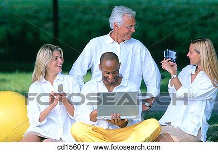 Team work, Multimedia, Together View Large Photo Image Stock Photo - Team work, Multimedia, Together. Fotosearch