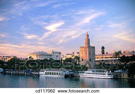 Torre del Oro, Almohade tower built in the XIII century to defend the city. Seville. Spain View Large Photo Image Stock Image - Torre del Oro, Almohade tower built in the XIII century to defend the city. Seville. Spain. Fotosearch