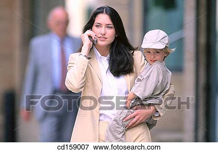 Stock Photo - Walking, Telecommunication, Call. Fotosearch