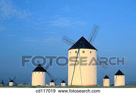 Windmills at the village Campo de Criptana. Ciudad Real province. Spain View Large Photo Image Stock Photo - Windmills at the village Campo de Criptana. Ciudad Real province. Spain. Fotosearch