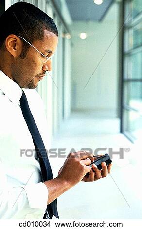 agenda, businessman, business, black, African-American View Large Photo Image Picture - agenda, businessman, business, black, African-American. Fotosearch