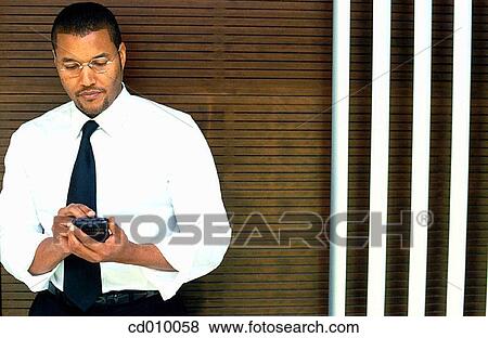 agenda, businessman, business, black, African-American View Large Photo Image Stock Photo - agenda, businessman, business, black, African-American. Fotosearch