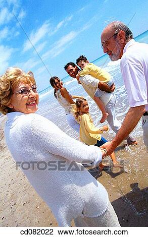 amusement, boy, beach, 3 generations View Large Photo Image Stock Image - amusement, boy, beach, 3 generations. Fotosearch