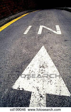 Arrow and sign on road saying? in? View Large Photo Image Stock Photograph - Arrow and sign on road saying? in?. Fotosearch