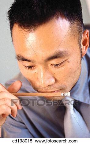Asian-American, businesspeople, businessman, business, absorbed View Large Photo Image Stock Photography - Asian-American, businesspeople, businessman, business, absorbed. Fotosearch