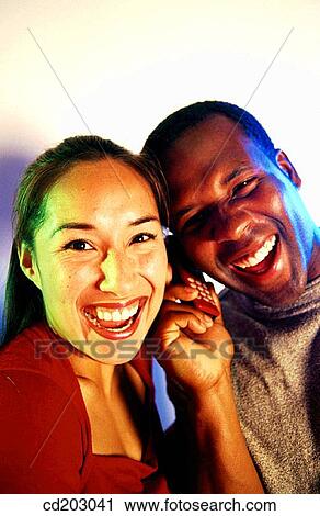 Asian-American, cell phone, black, African-American View Large Photo Image Stock Image - Asian-American, cell phone, black, African-American. Fotosearch