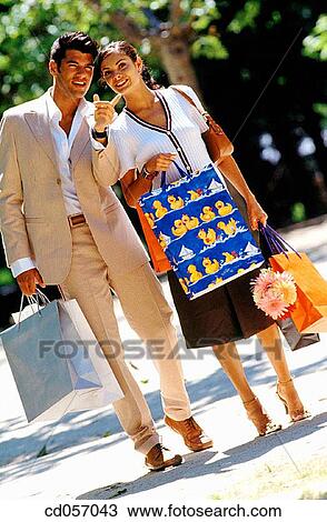 bag, brunette, contemporary, couple View Large Photo Image Stock Image - bag, brunette, contemporary, couple. Fotosearch
