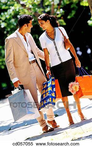 bag, brunette, contemporary, couple View Large Photo Image Stock Photography - bag, brunette, contemporary, couple. Fotosearch