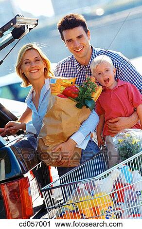 Stock Image - bag, car park, car, boy, automobile. Fotosearch