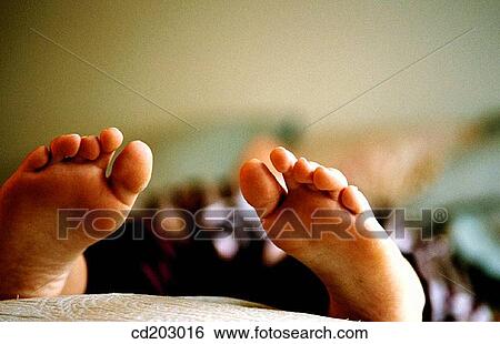 barefoot, bed, Close-up, comfort View Large Photo Image Stock Photograph - barefoot, bed, Close-up, comfort. Fotosearch
