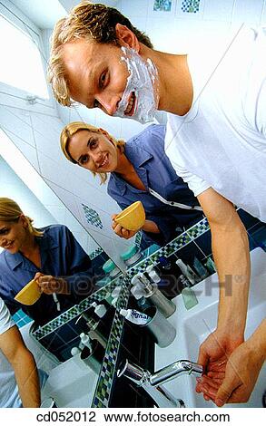 Stock Image - bathroom, breakfast, Body care, blond, at-home. Fotosearch