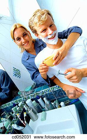 Stock Image - bathroom, breakfast, Body care, blond, at-home. Fotosearch