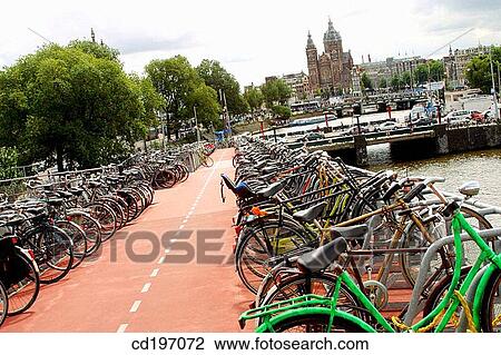Bike park at Central Station. Amsterdam. Holland View Large Photo Image Stock Image - Bike park at Central Station. Amsterdam. Holland. Fotosearch