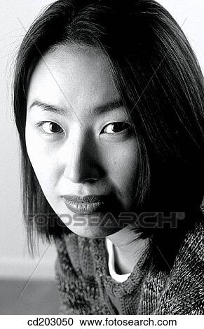 Stock Image - black and white, distrust, contemporary, Close-up, Asian. Fotosearch
