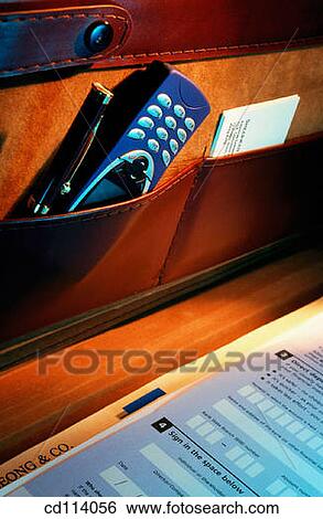 Briefcase, cell phone View Large Photo Image Stock Photograph - Briefcase, cell phone. Fotosearch