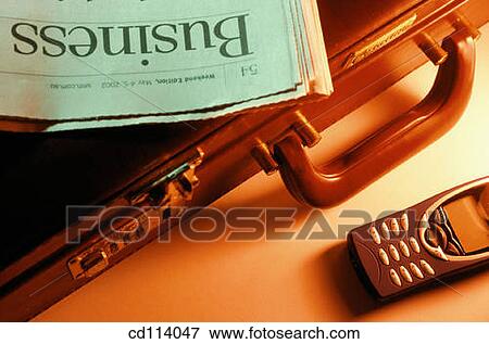Briefcase, financial papers and cell phone View Large Photo Image Stock Photo - Briefcase, financial papers and cell phone. Fotosearch