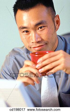 Stock Photo - business, businesspeople, businessman, Asian-American. Fotosearch