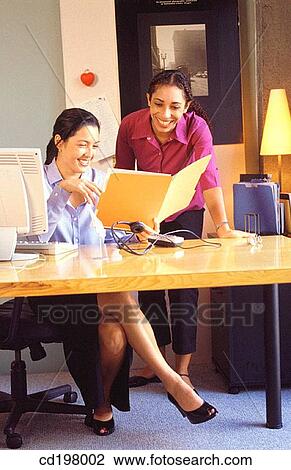 Stock Image - business, businesswoman, businesspeople, achievement. Fotosearch