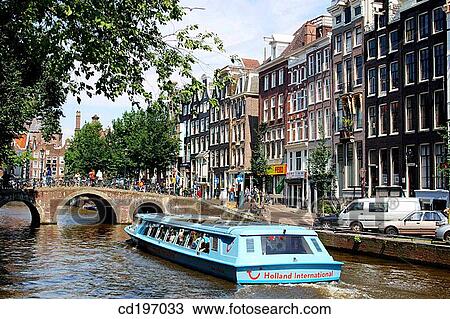Canal cruise boat. Amsterdam. Holland View Large Photo Image Stock Image - Canal cruise boat. Amsterdam. Holland. Fotosearch