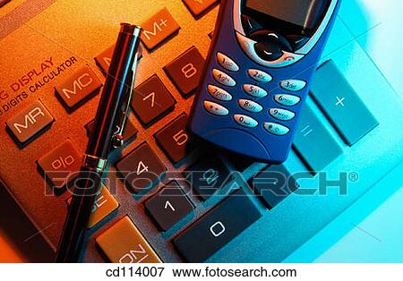 Cell phone and electronic calculator View Large Photo Image Stock Photo - Cell phone and electronic calculator. Fotosearch