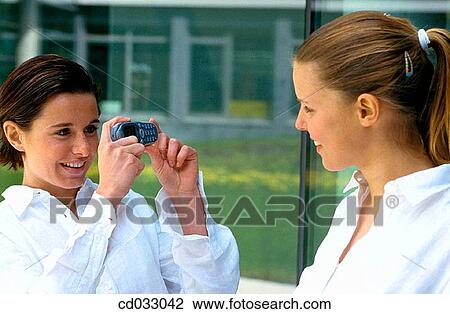 cell phone, companion, companionship, contemporary View Large Photo Image Stock Image - cell phone, companion, companionship, contemporary. Fotosearch