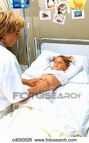 Stock Photograph - Checking for appendicitis symptoms. Fotosearch