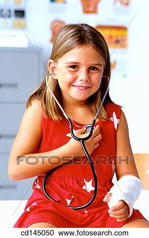Stock Image - child, auscultate, cast, broken, auscultation, arm. Fotosearch
