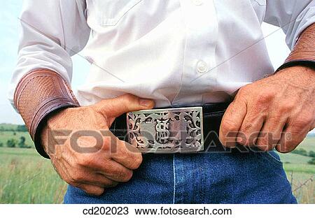 Close up on a silver Cowboy belt buckle featuring a dollar. Fort Worth. Texas. USA View Large Photo Image Stock Image - Close up on a silver Cowboy belt buckle featuring a dollar. Fort Worth. Texas. USA. Fotosearch