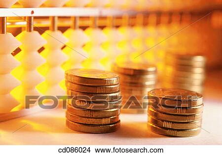 Coins and abacus View Large Photo Image Picture - Coins and abacus. Fotosearch