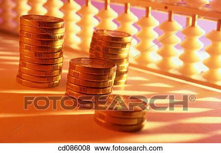 Coins and abacus View Large Photo Image Stock Photo - Coins and abacus. Fotosearch