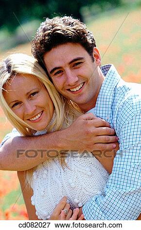 Stock Photo - contemporary, couple, day, embracing. Fotosearch