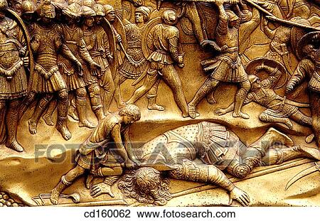 David slaying Goliath, Ghiberti's? Gates of Paradise?. Baptistery. Florence. Italy View Large Photo Image Stock Image - David slaying Goliath, Ghiberti's? Gates of Paradise?. Baptistery. Florence. Italy. Fotosearch