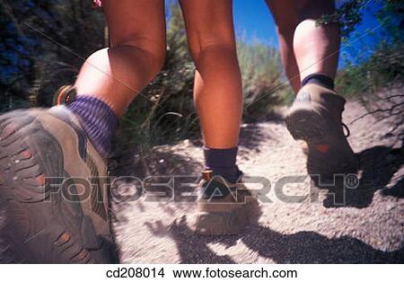 Detail of a woman and daughter hiking View Large Photo Image Picture - Detail of a woman and daughter hiking. Fotosearch