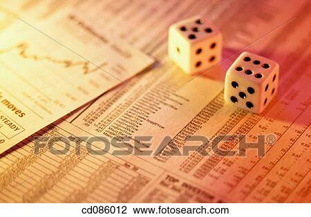 Stock Image - Dice on financial page. Fotosearch
