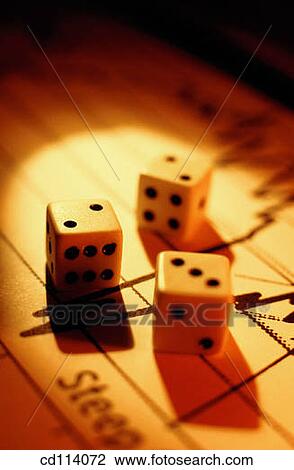 Dice on stock page View Large Photo Image Stock Image - Dice on stock page. Fotosearch