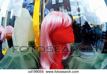 Dummy with wig in shop window View Large Photo Image Stock Photography - Dummy with wig in shop window. Fotosearch